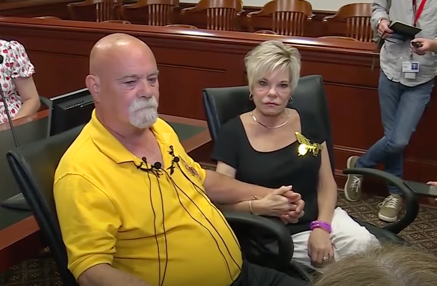 The parents of Katelyn Markham speak with reporters after John Carter was sentenced to three years in prison for involuntary manslaughter